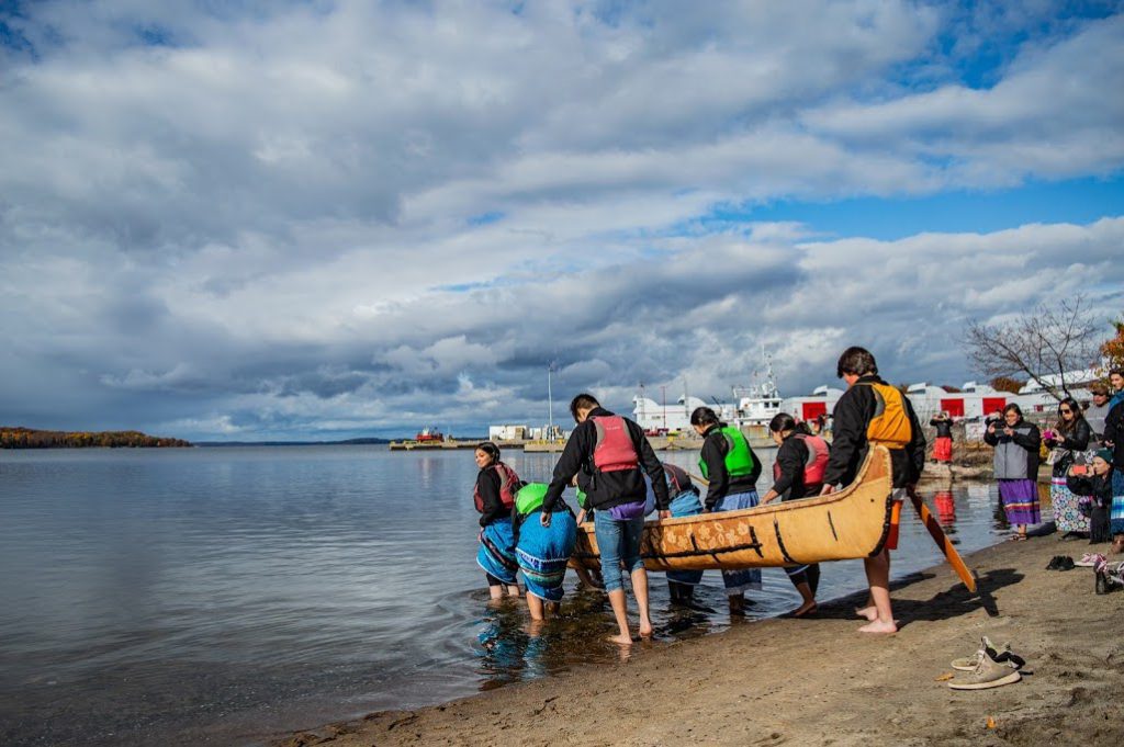 GBAY youth putting Oshkinigig into the water for the first time Photo Credits: Delaina Rice